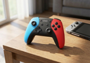 Control Joystick Controller Compatible - a clean wooden table next to a console, dayl