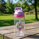 Botella Agua Niños Barbie & Pets 420ml - on a picnic table in a sunny park, green gra