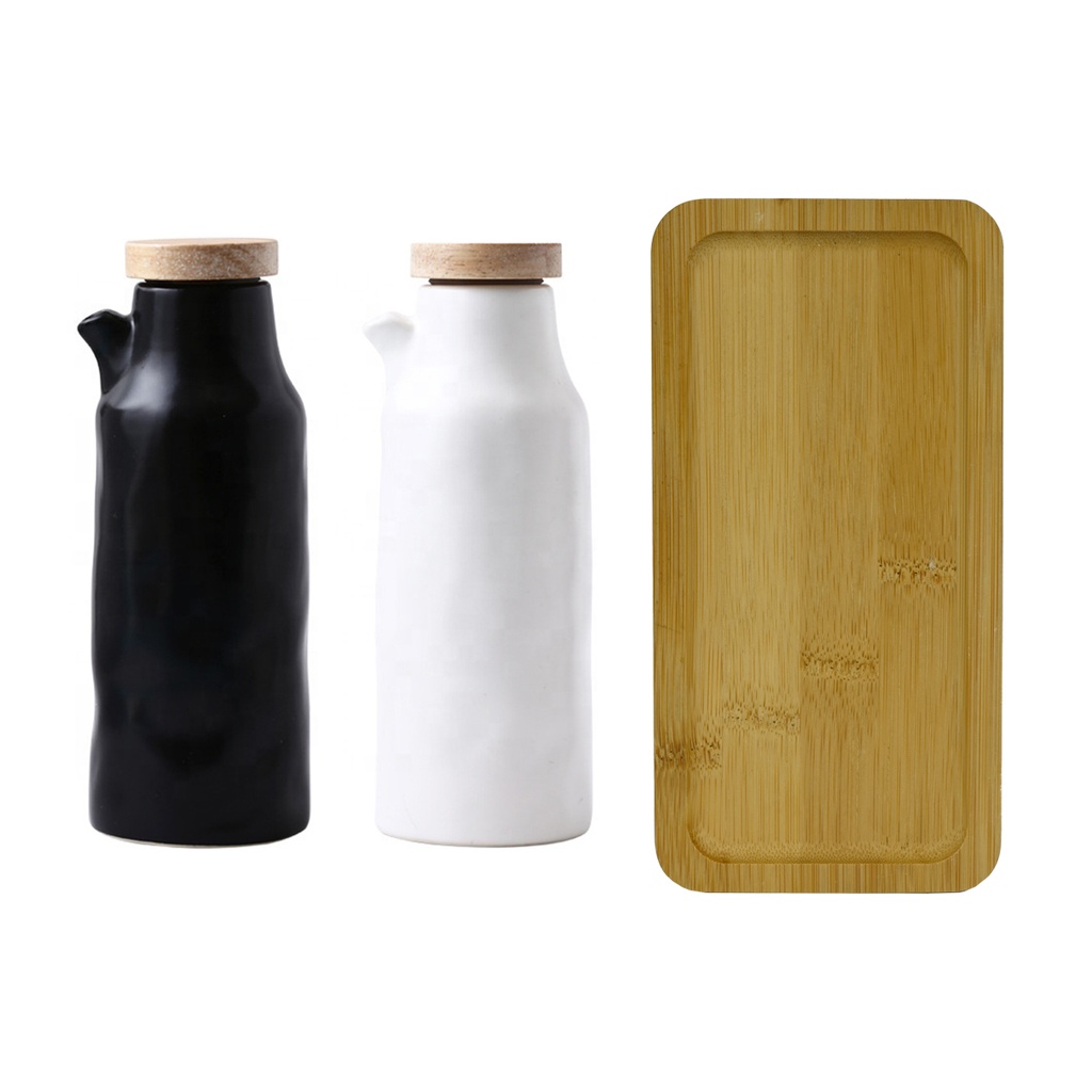 Alcuza negra, alcuza blanca y la base de madera por separado